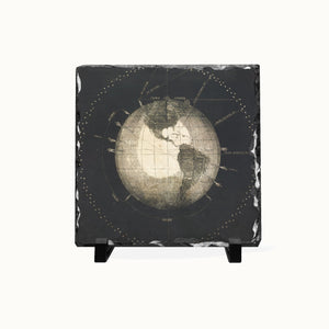 A square black slate coaster or decorative tile featuring an antique-style vintage globe map print, displayed on a small black stand against a clean white background.