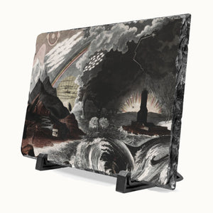 A square slate art plaque featuring a dramatic monochrome seascape painting with storm clouds, waves, mountains, and a lighthouse, displayed on a black stand against a white background.