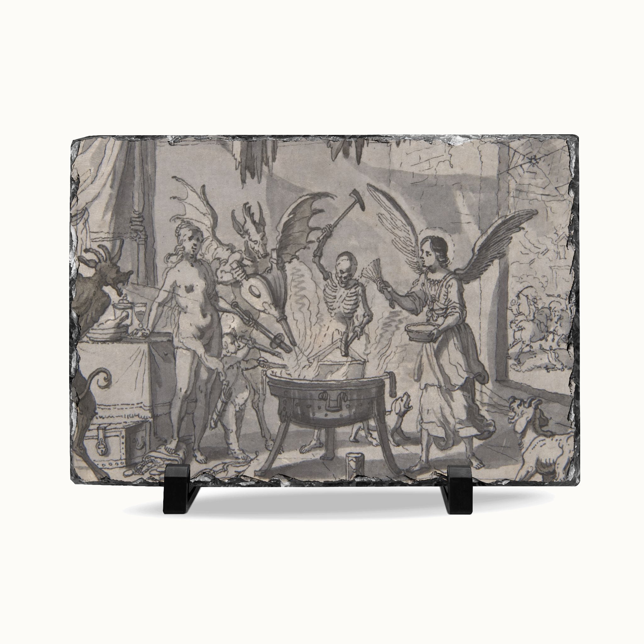 A rectangular slate serving board featuring a detailed black and white illustration of a classical mythological scene with a skeleton, winged figures, and animals, displayed on a clean white background with two small black display stands.